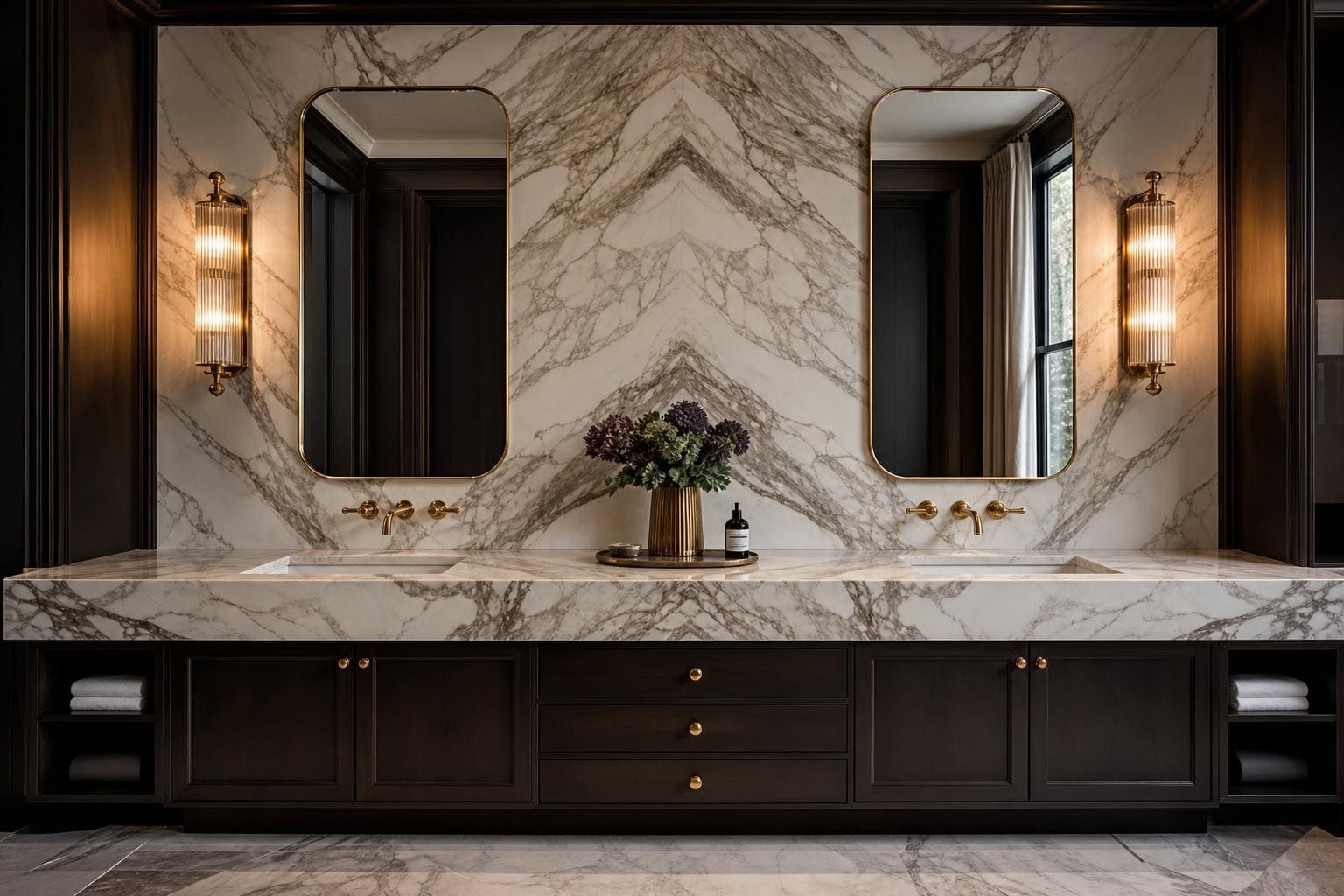Luxury bathroom with book-matched Calacatta marble vanity and slab wall
